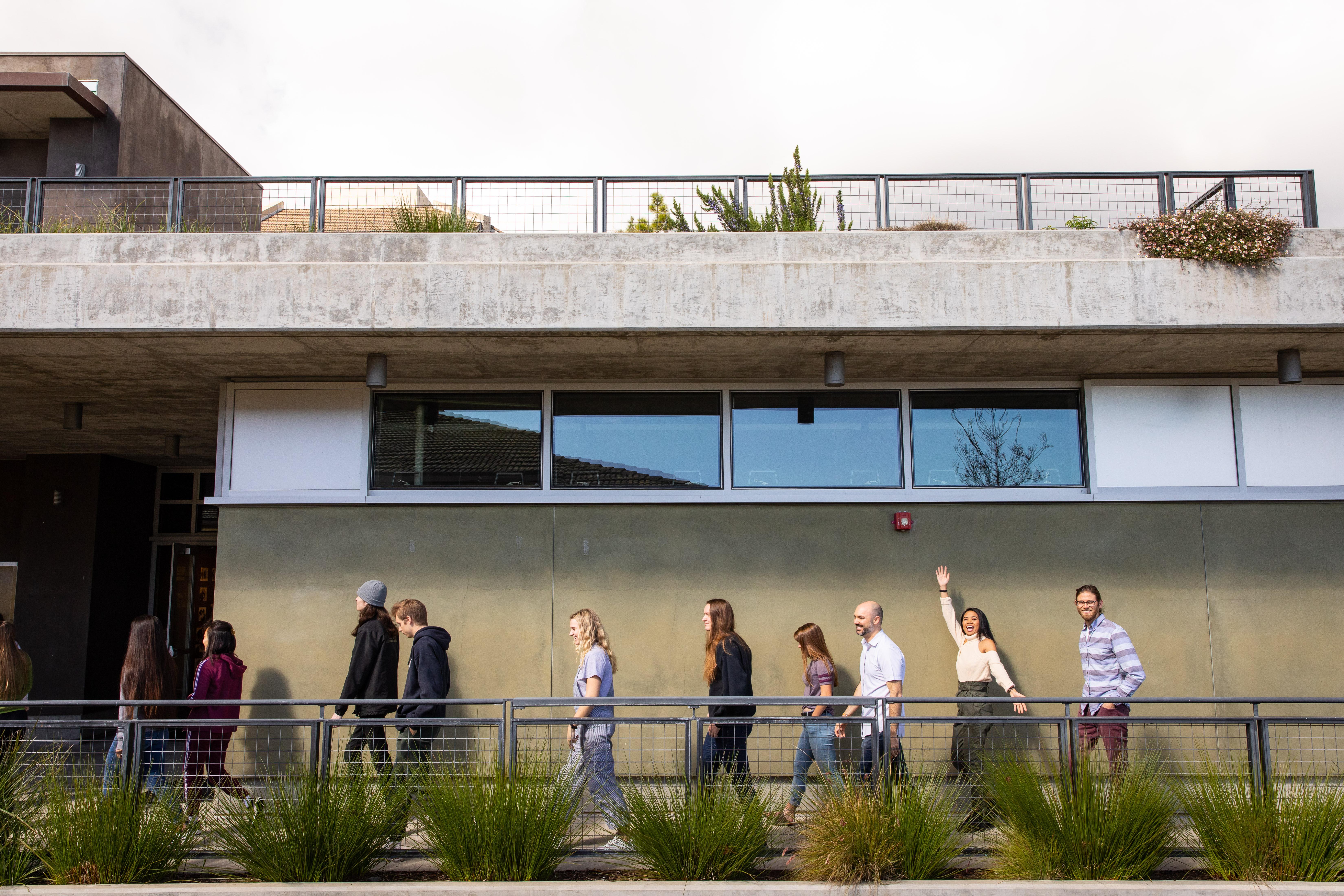 westmont students walking in front of building